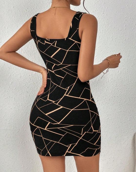 Woman wearing a fitted black mini dress with abstract tan geometric lines and a square neckline, posing confidently against a white wall.

