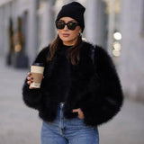 Iconic Street Fashion Week-black fur coat-6