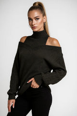 Cold-shoulder knit layer with luxe texture and refined styling, designed for quiet luxury and versatile layering.